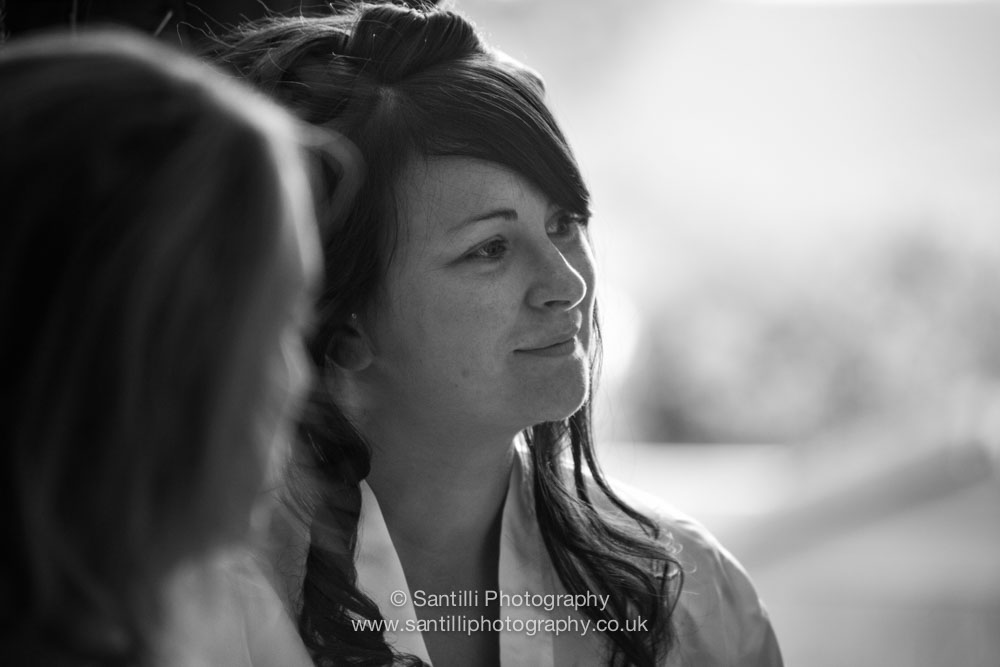 Having her hair done during the bridal preperations