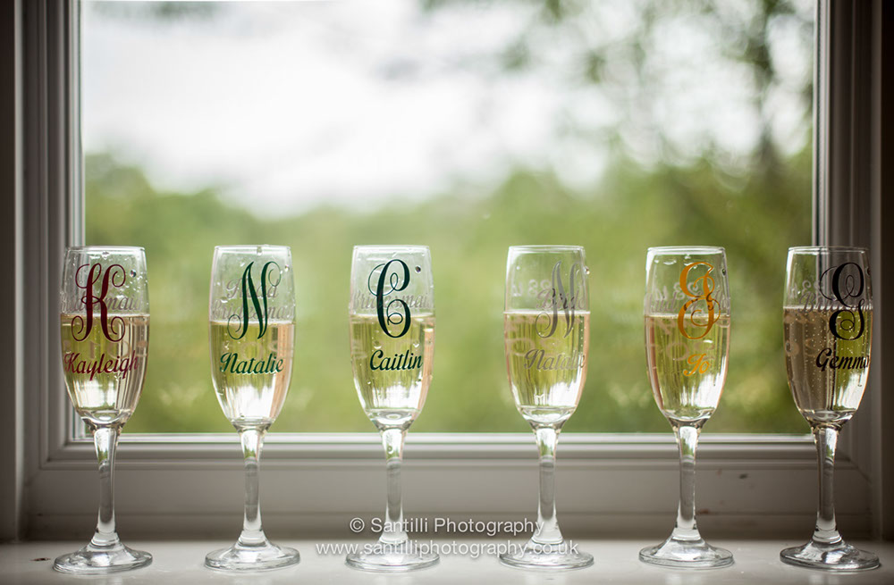 Champange flutes with bespoke names and titles
