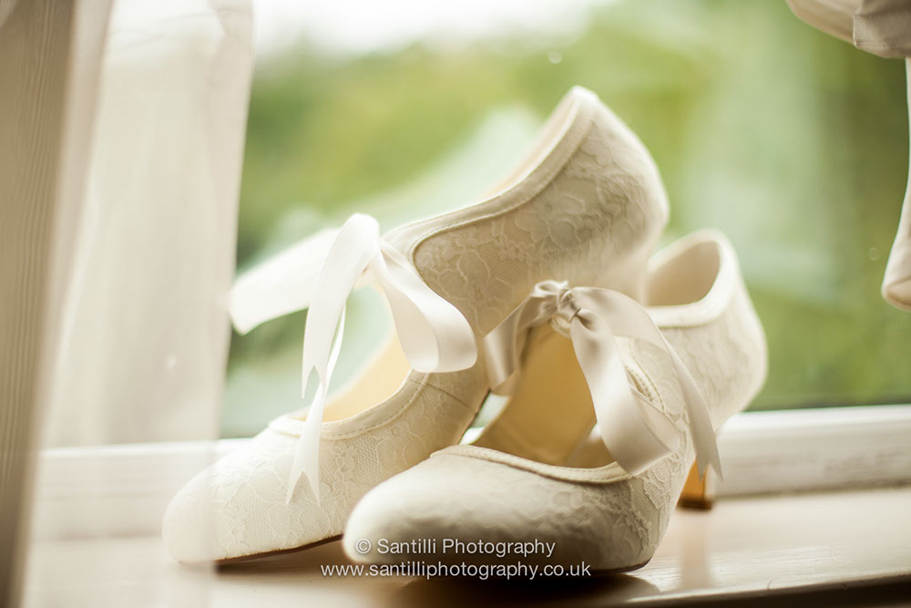 Never forget the wedding shoes. Beautiful is one thing. Let's hope they are comfortable as well.
