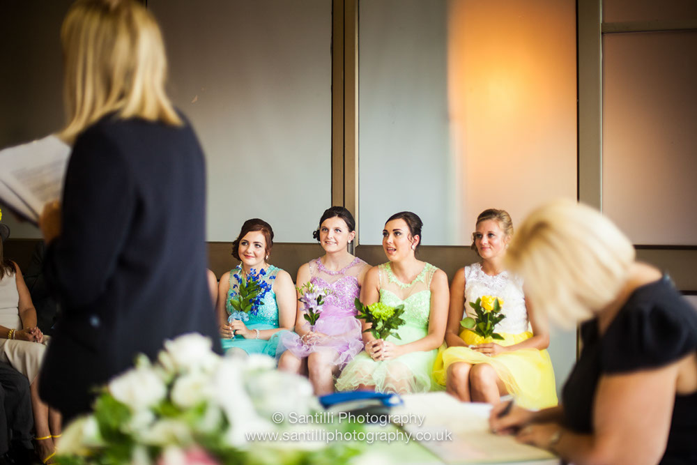 The bridesmaids looking colourful and shedding a tear or two of happiness