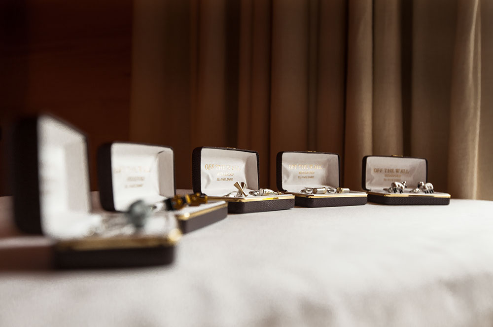 Each pair of cufflinks are specific to each groom and best man.