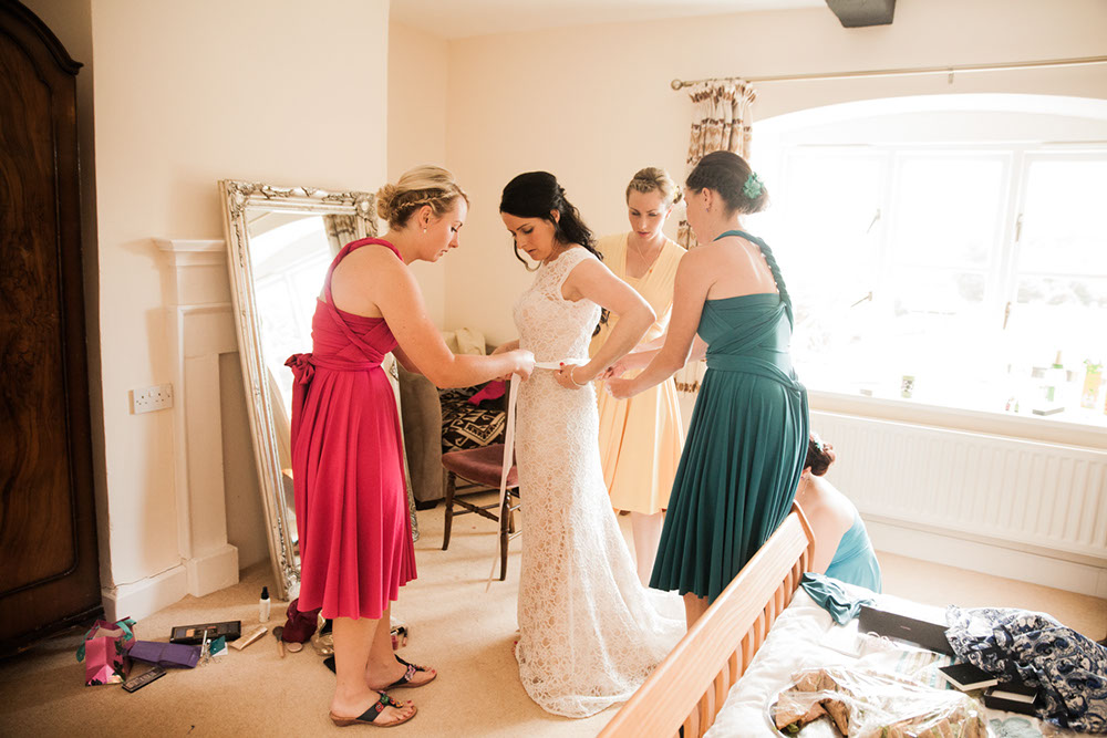 Making sure the wedding dress fits.