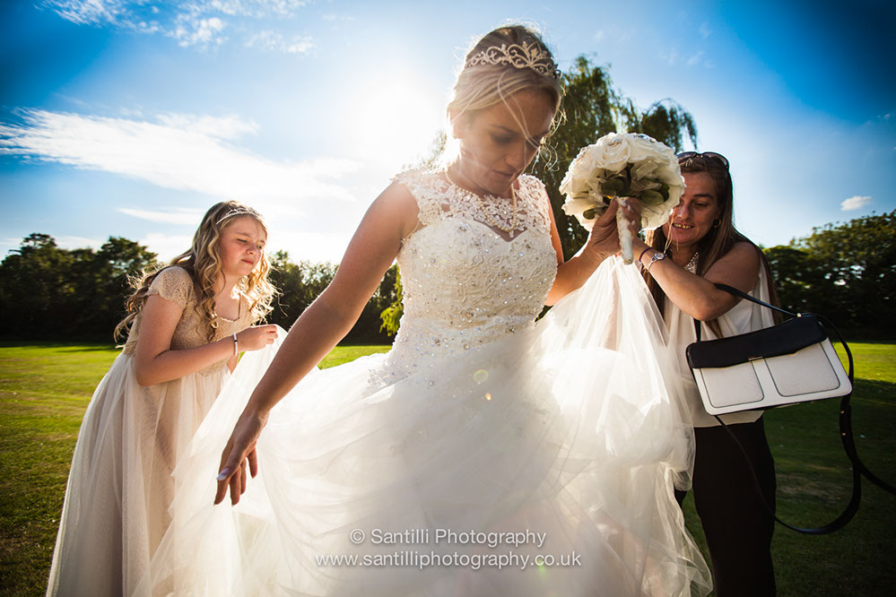 A flower girl on the dance floor at the wedding breakfast.